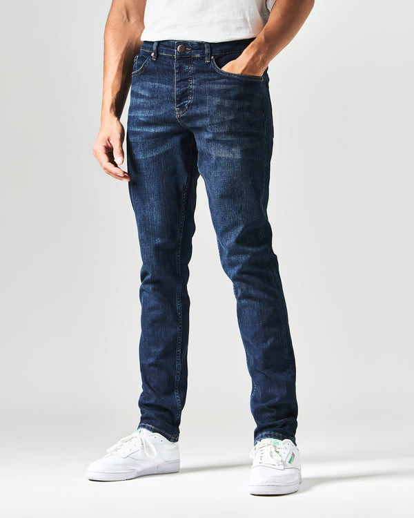 444 Tapered Dark Vintage Denim Jeans